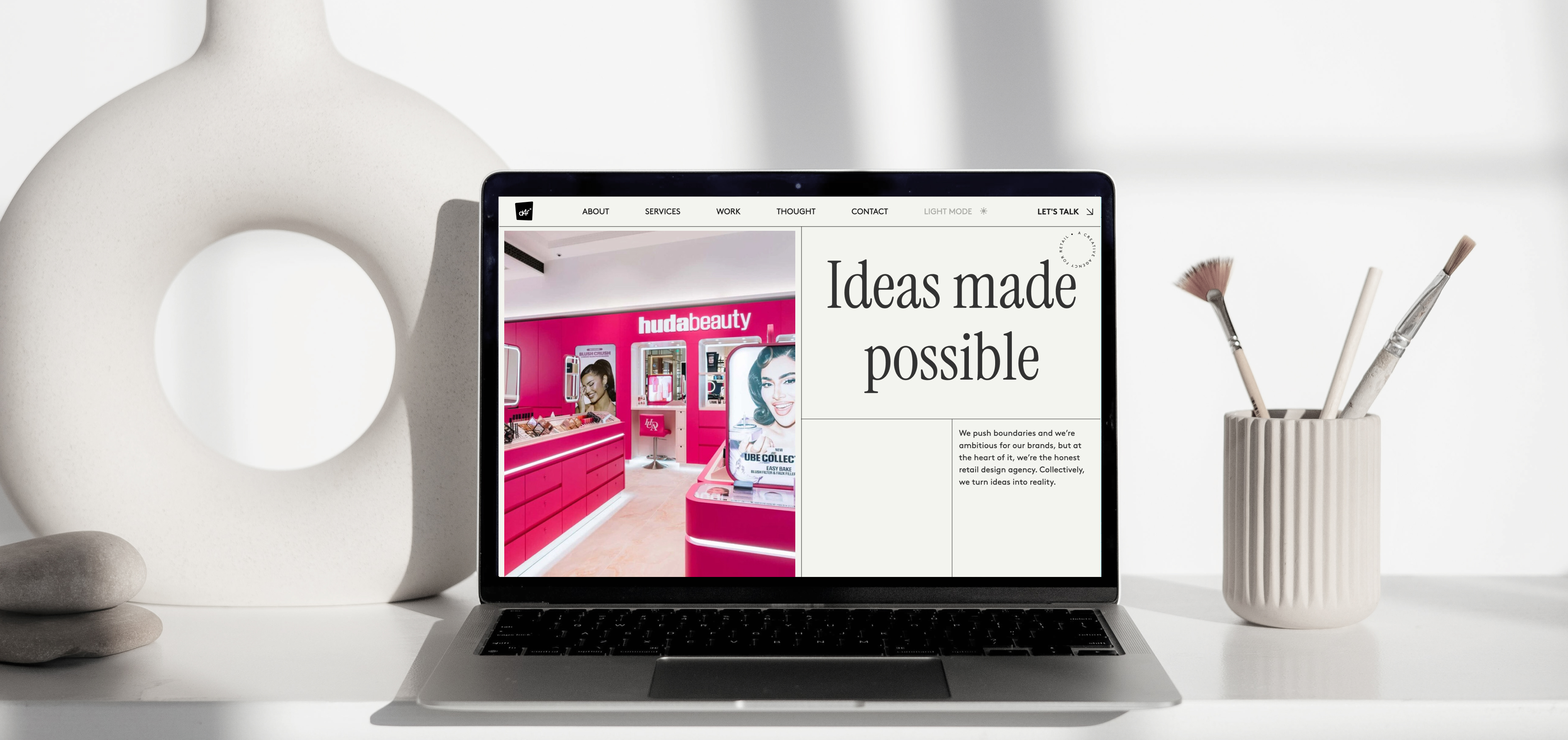 Stationery design of letterhead and business cards for the company Anders on top of a blurred photo of a house interior.